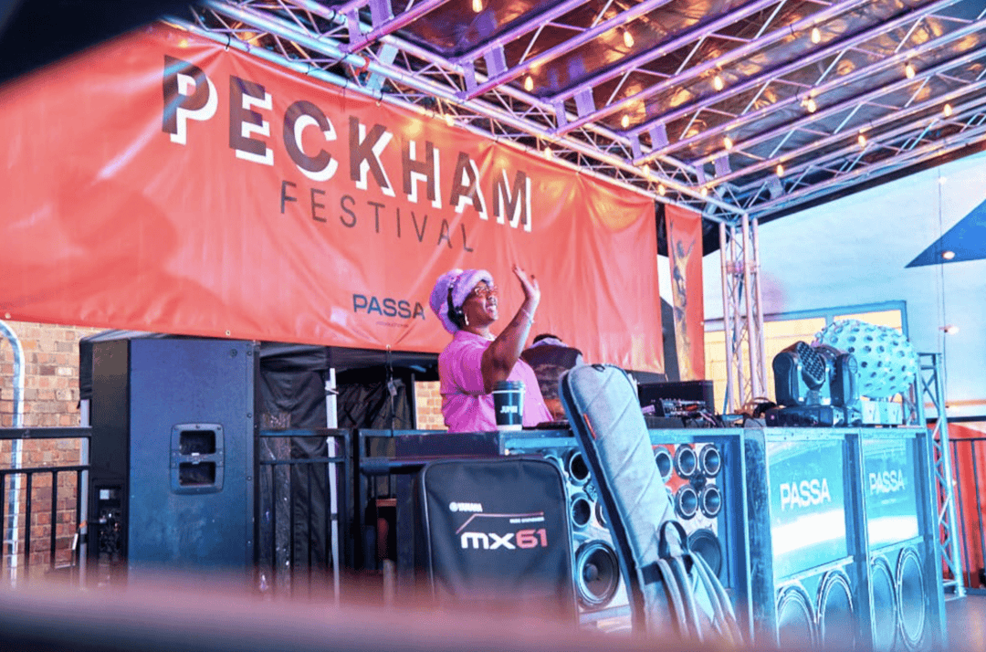 A woman on stage at Peckham Festival.